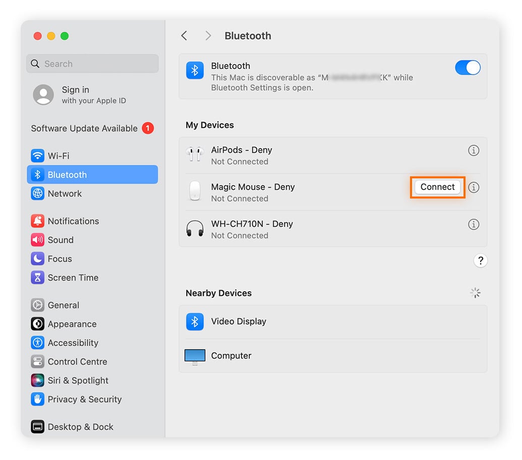 Reconnecting a wireless mouse to Bluetooth on a Mac.